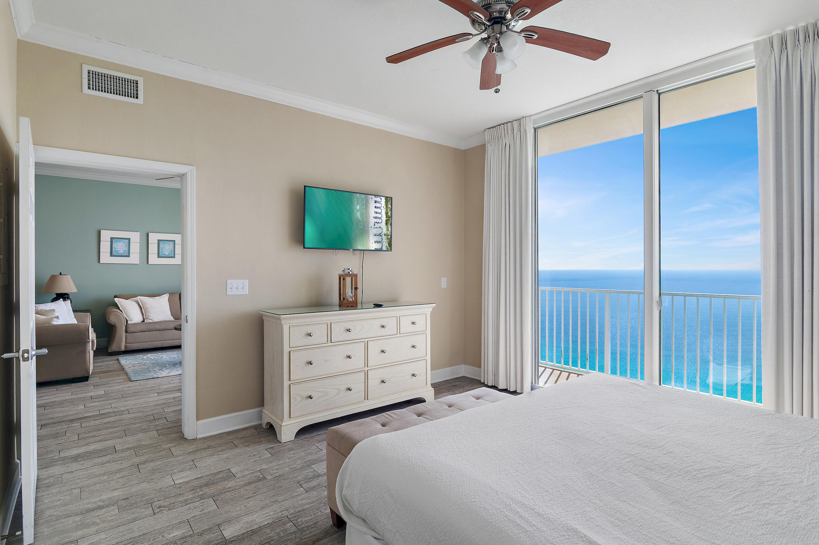 16819 Front Beach Road, Unit 2612 Panama City Beach, FL 32413 - Photo 18 of 53 a bed room with a bed and a television