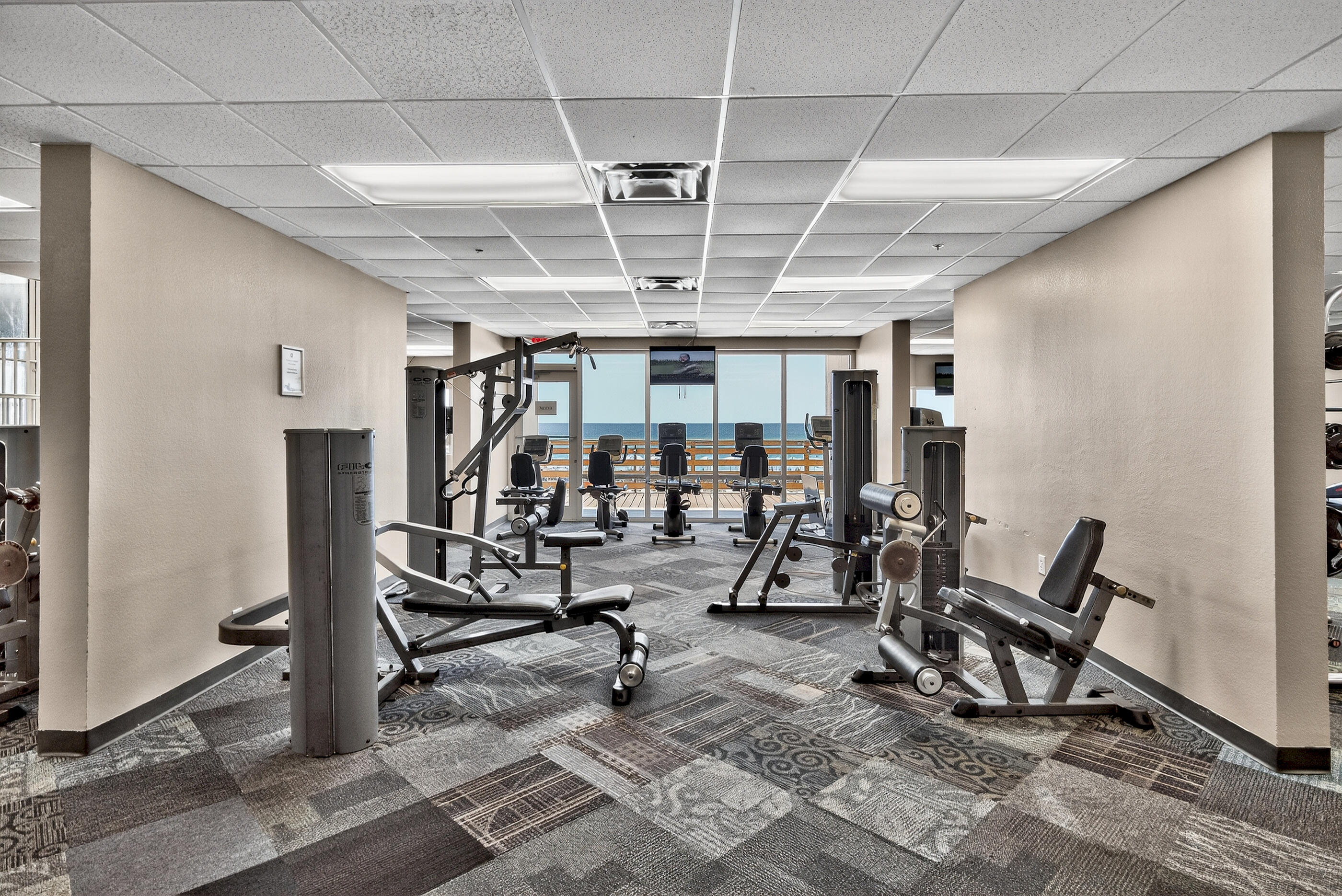 16819 Front Beach Road, Unit 2612 Panama City Beach, FL 32413 - Photo 27 of 53 a view of a room with gym equipment