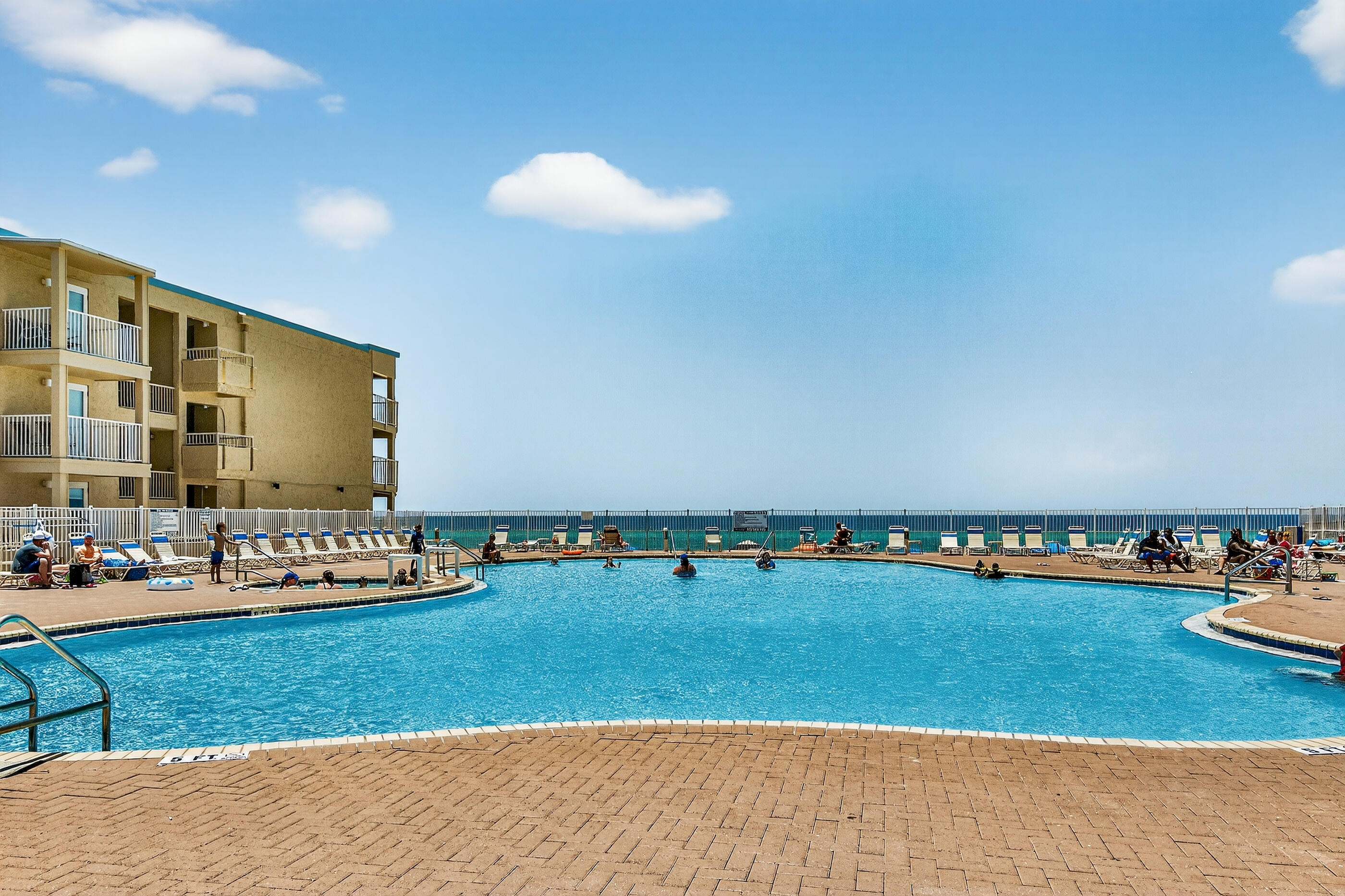 16819 Front Beach Road, Unit 2612 Panama City Beach, FL 32413 - Photo 28 of 53 a view of swimming pool and outdoor seating