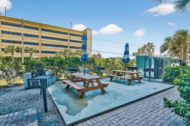 a room with furniture and a projector screen