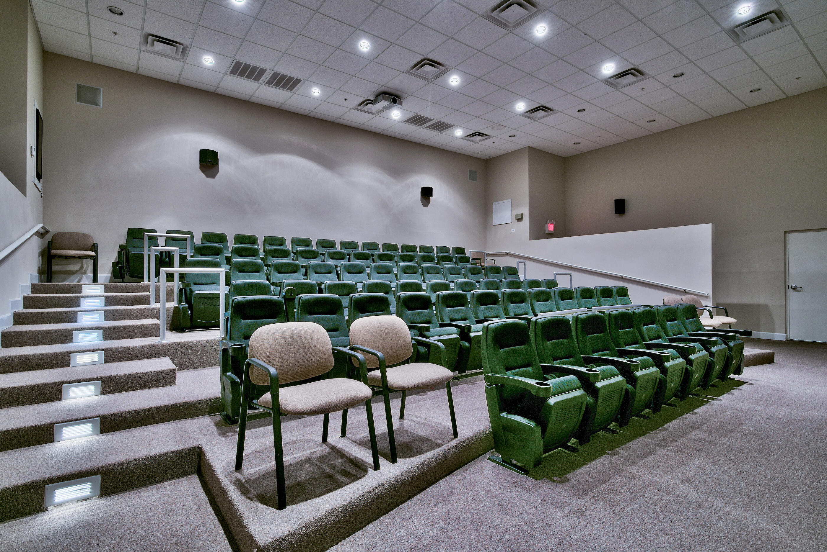 16819 Front Beach Road, Unit 2612 Panama City Beach, FL 32413 - Photo 31 of 53 a room with furniture and a projector screen