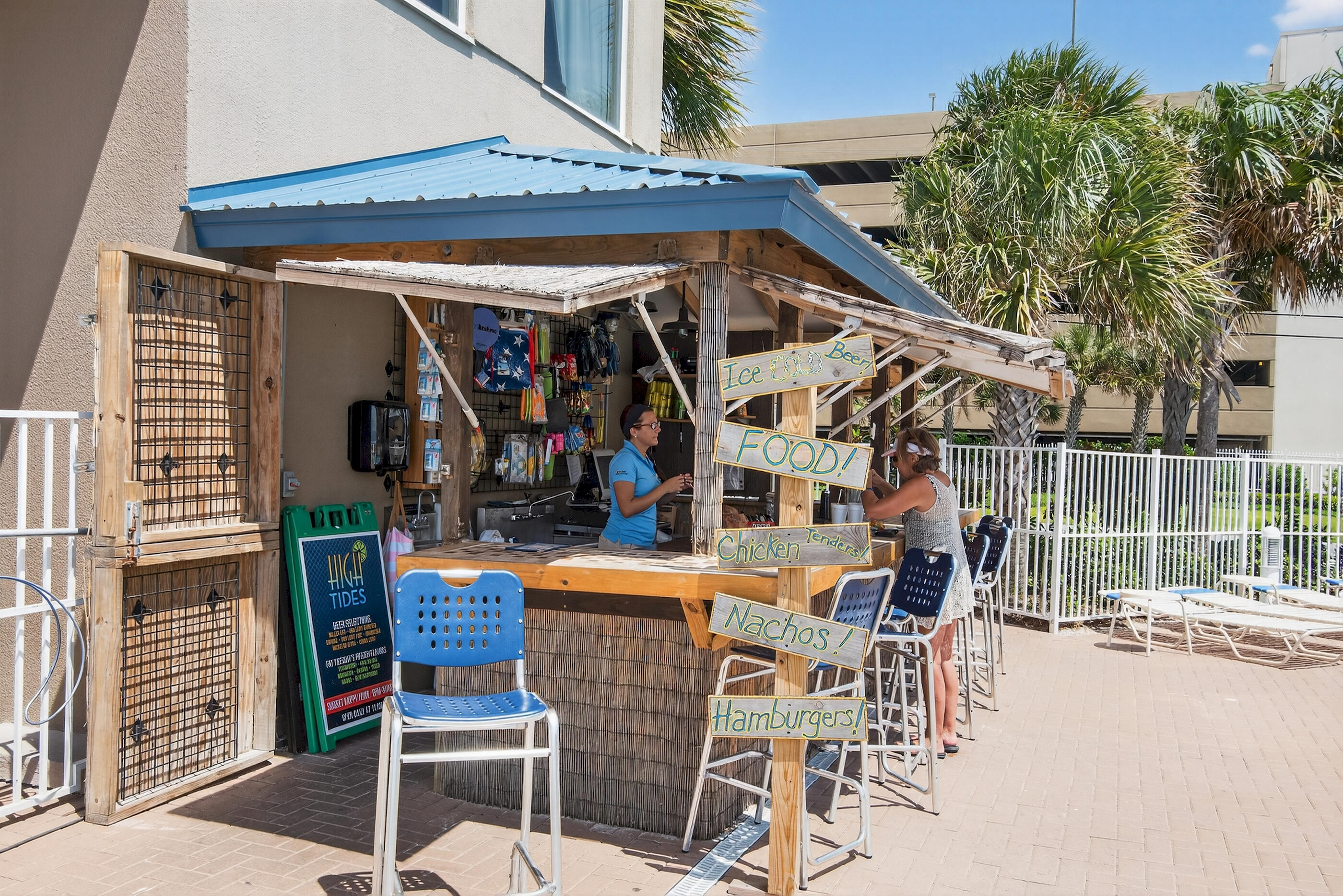 16819 Front Beach Road, Unit 2612 Panama City Beach, FL 32413 - Photo 49 of 53 a view of a chairs and table in the patio