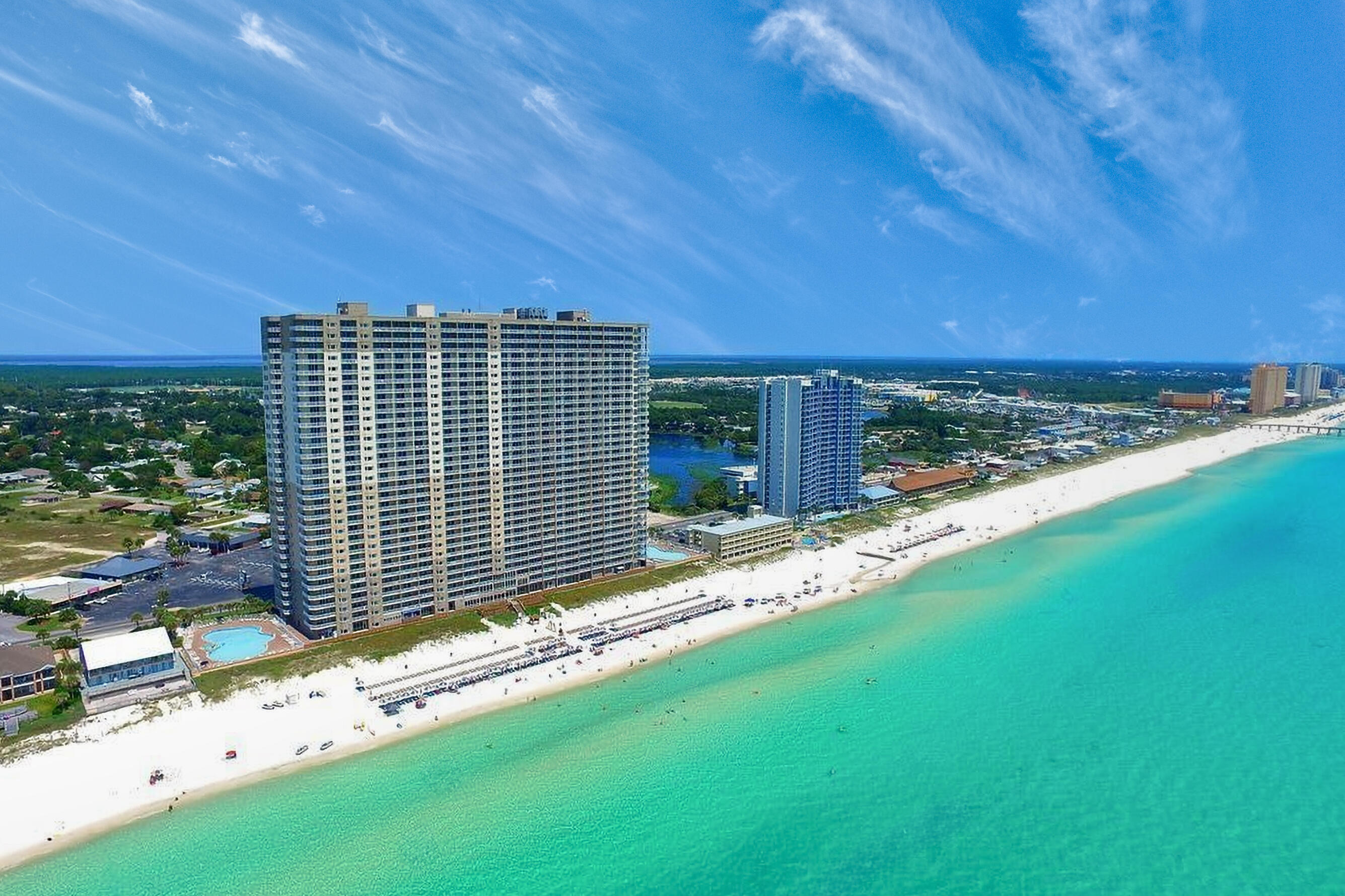 16819 Front Beach Road, Unit 2612 Panama City Beach, FL 32413 - Photo 52 of 53 a view of an house with backyard and garden