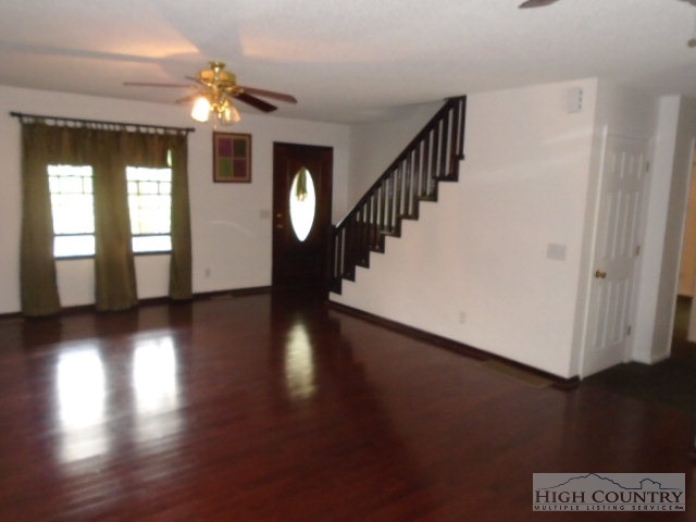 717 A Deep Ford Road Lansing, NC 28643 - Photo 13 of 18 a view of entryway and hall with wooden floor