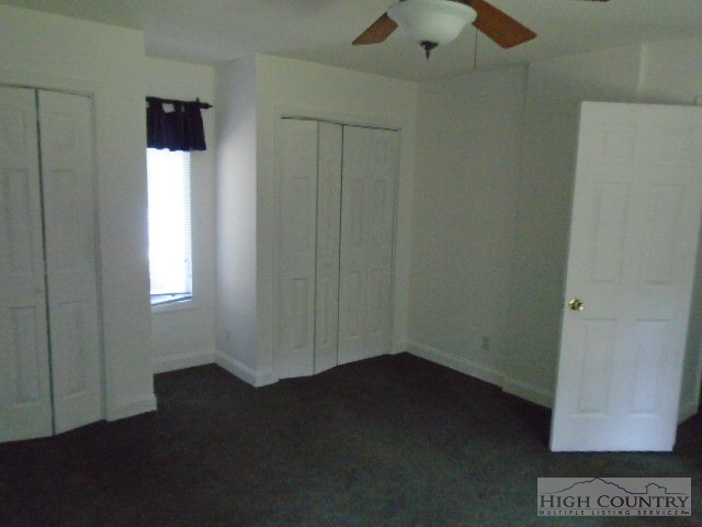 717 A Deep Ford Road Lansing, NC 28643 - Photo 15 of 18 an empty room with a window