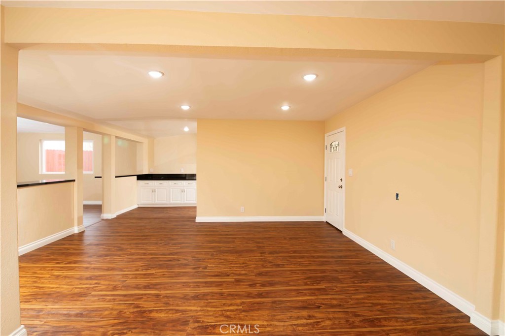 143 West 234th Place Carson, CA 90745 - Photo 12 of 46 a view of empty room with wooden floor