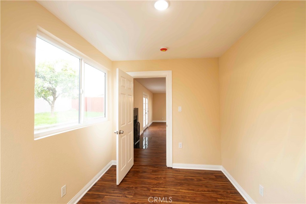 143 West 234th Place Carson, CA 90745 - Photo 22 of 46 a view of hallway with wooden floor