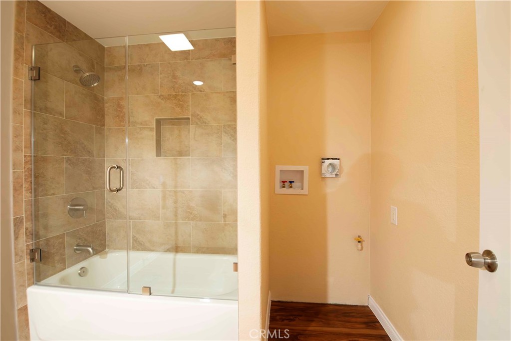 143 West 234th Place Carson, CA 90745 - Photo 45 of 46 a bathroom with a bathtub