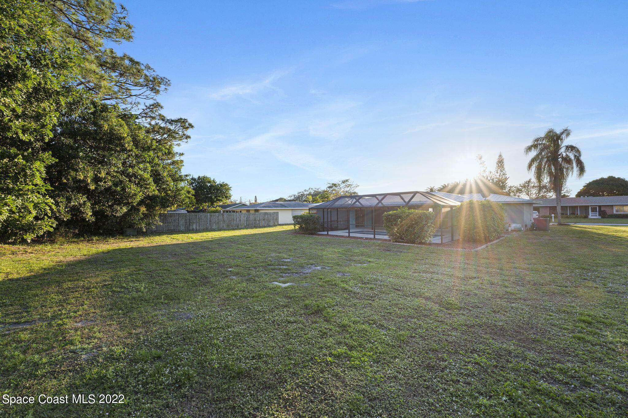1141 Cromey Road Northeast Palm Bay, FL 32905 - Photo 25 of 27 a view of a field with an ocean