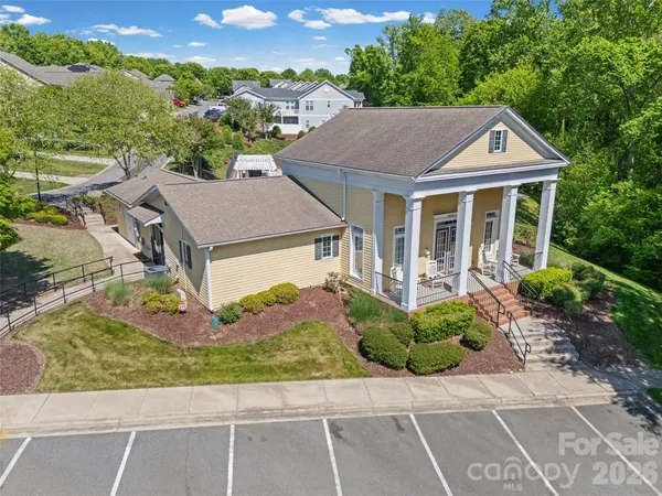 a house with a garden in the background