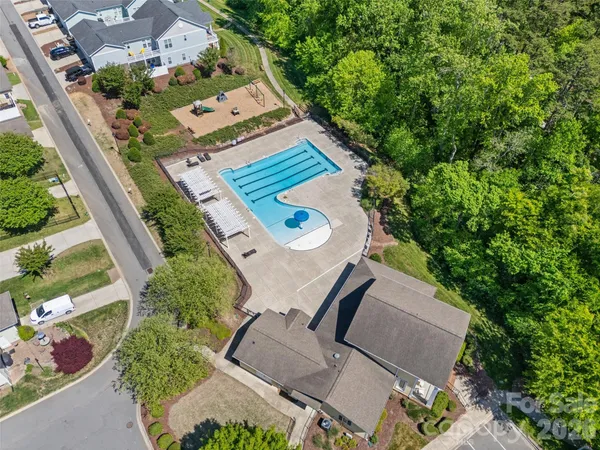 an aerial view of a house with a garden