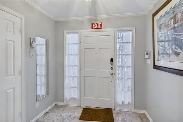 a room with windows and closet
