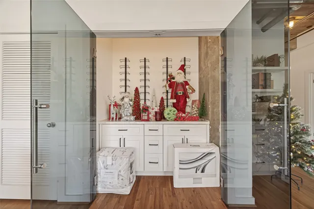 a kitchen with appliances a refrigerator and a sink