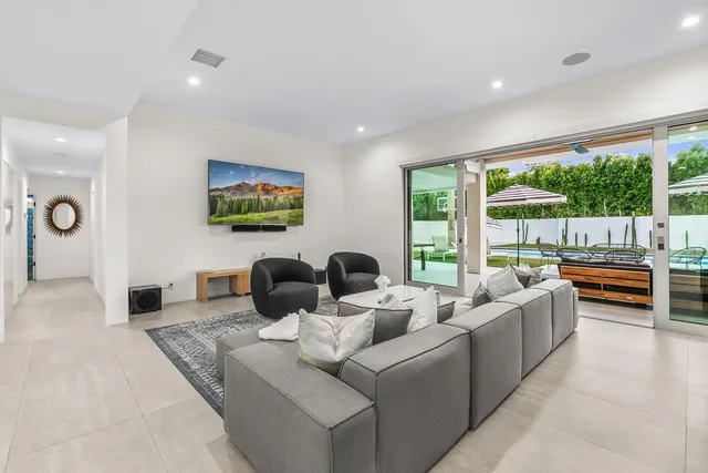 a kitchen with a sink stainless steel appliances and cabinets