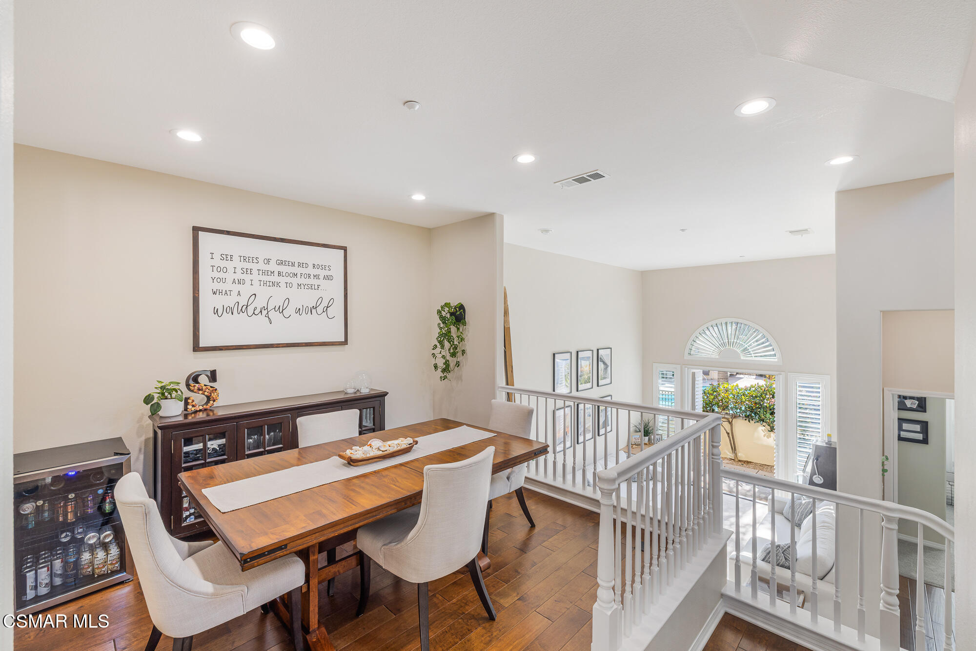 1240 Bayside Lane Oxnard, CA 93035 - Photo 15 of 51 a living room with furniture a dining table and a potted plant