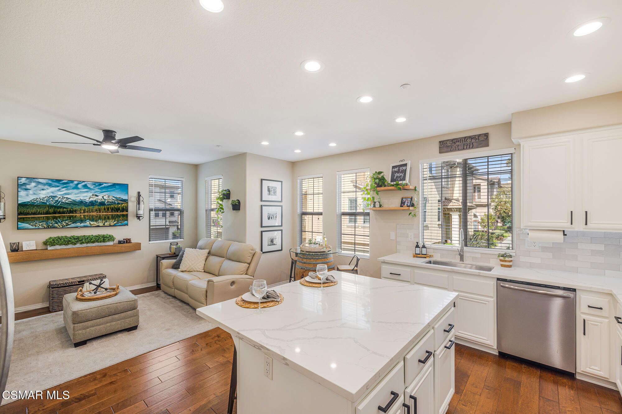 1240 Bayside Lane Oxnard, CA 93035 - Photo 22 of 51 a large white kitchen with a large window