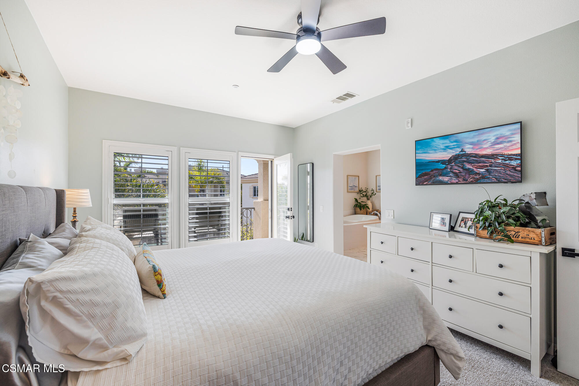 1240 Bayside Lane Oxnard, CA 93035 - Photo 29 of 51 a bedroom with a large bed and a window