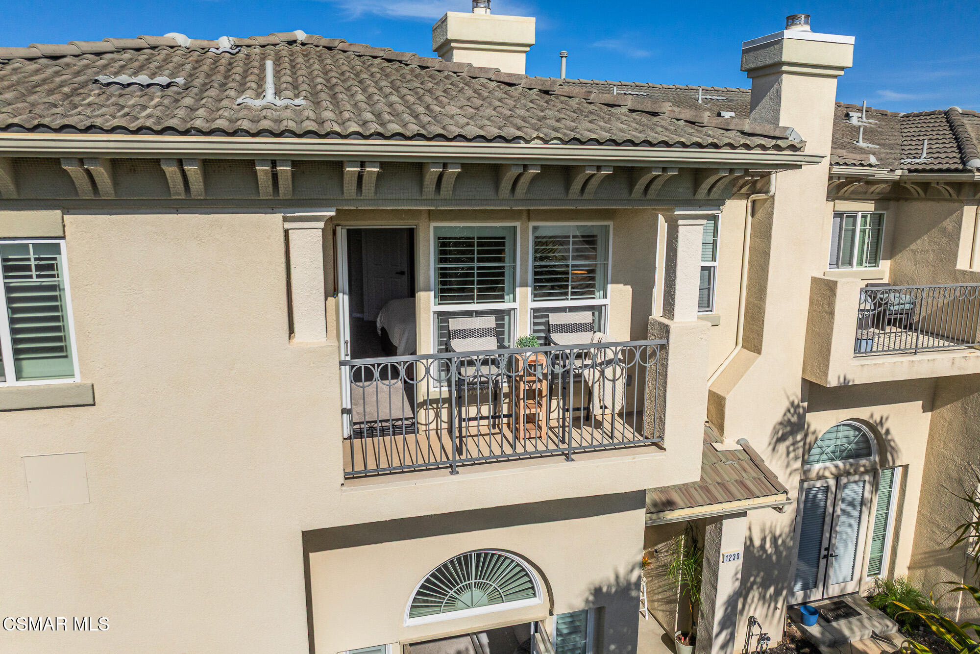 1240 Bayside Lane Oxnard, CA 93035 - Photo 41 of 51 a view of a house with large windows