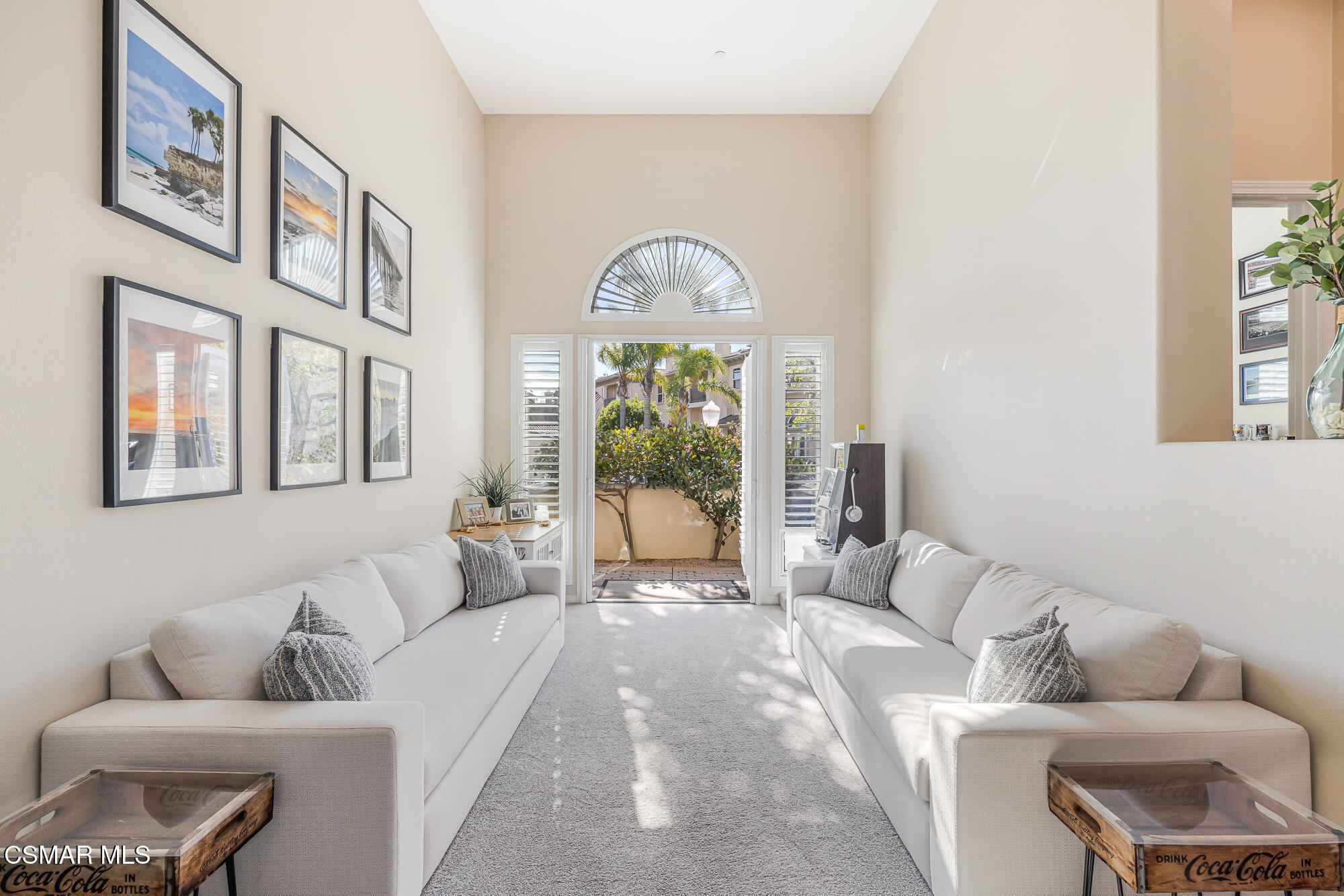 1240 Bayside Lane Oxnard, CA 93035 - Photo 9 of 51 a living room with furniture and a large window