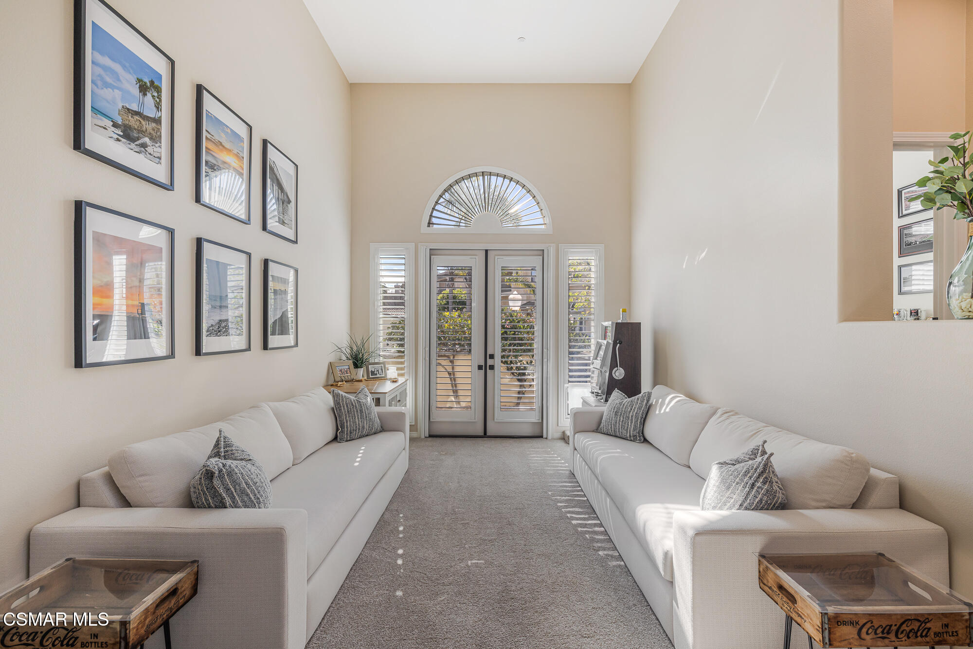 1240 Bayside Lane Oxnard, CA 93035 - Photo 10 of 51 a living room with furniture and a large window