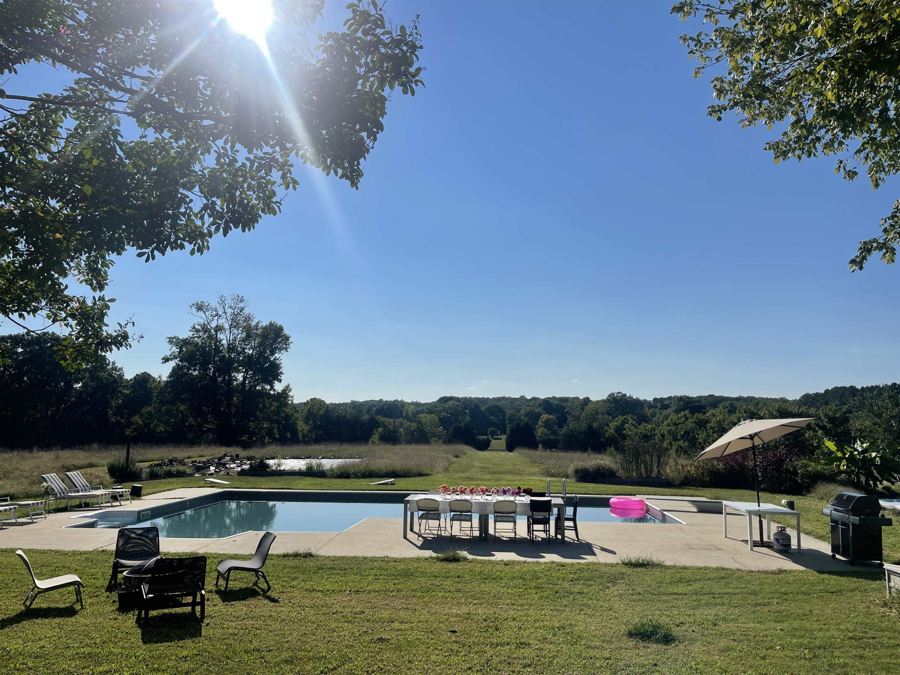10611 Rougemont Road Bahama, NC 27503 - Photo 1 of 66 a view of swimming pool with a yard