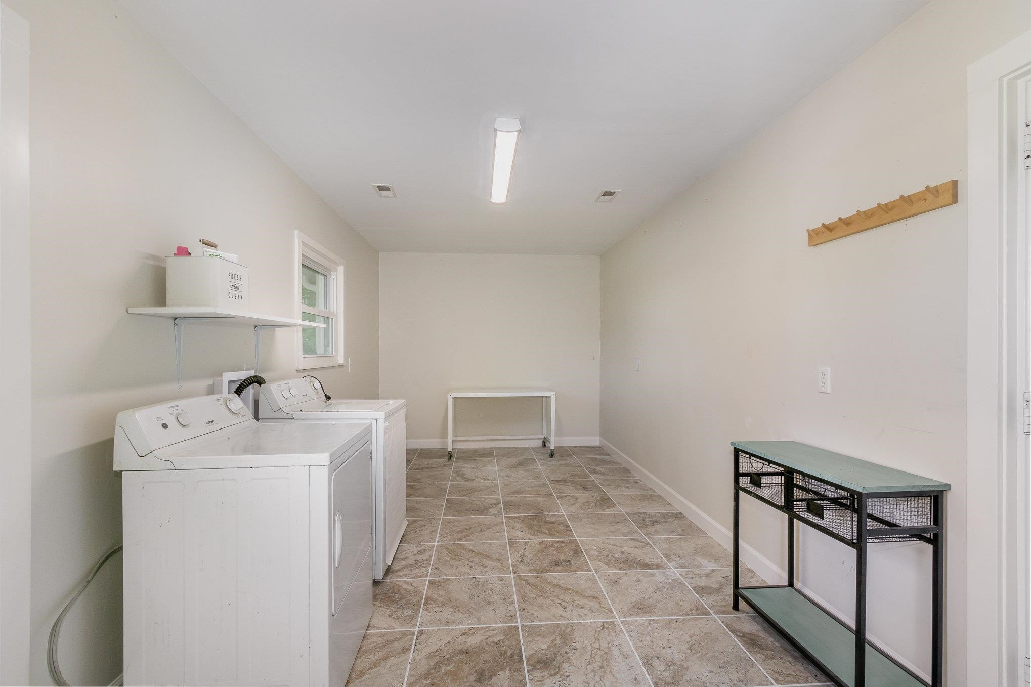 10611 Rougemont Road Bahama, NC 27503 - Photo 13 of 66 a utility room with dryer and washer