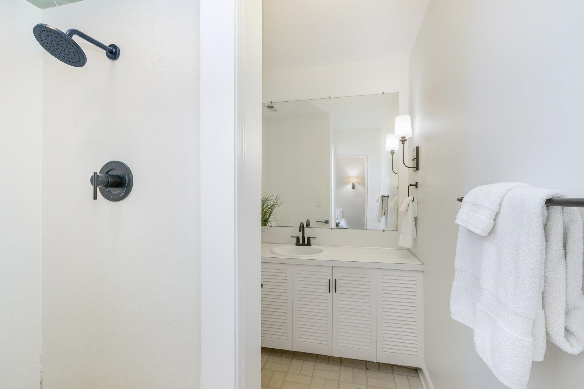 10611 Rougemont Road Bahama, NC 27503 - Photo 16 of 66 a bathroom with a sink and mirror