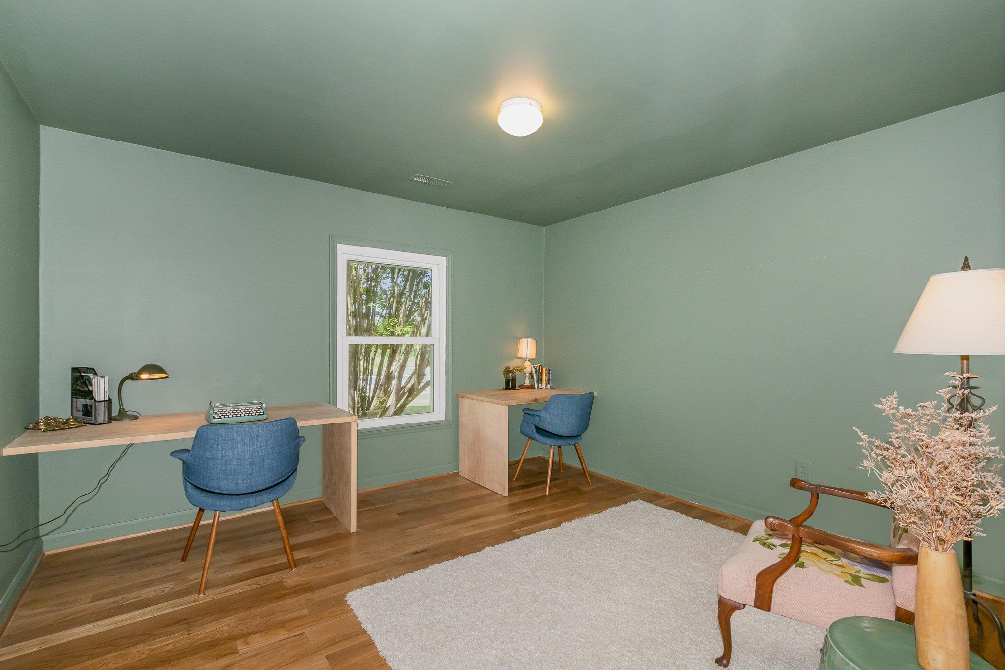 10611 Rougemont Road Bahama, NC 27503 - Photo 18 of 66 a workspace with furniture and window