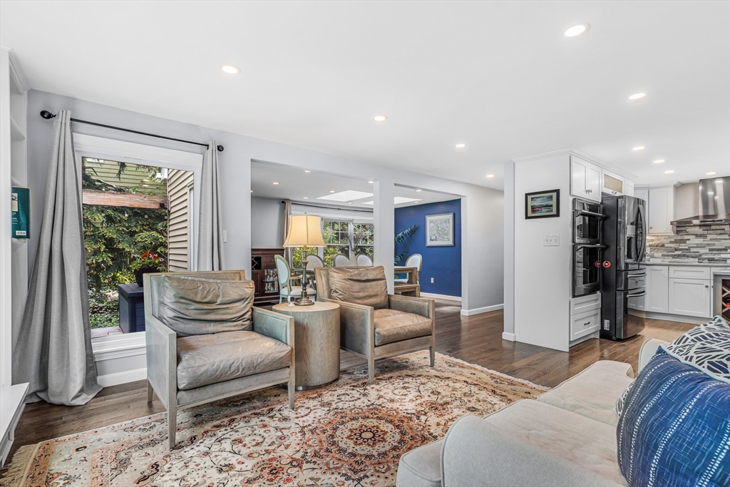 121 Shade Street Lexington, MA 02421 - Photo 12 of 42 a living room with furniture and a large window