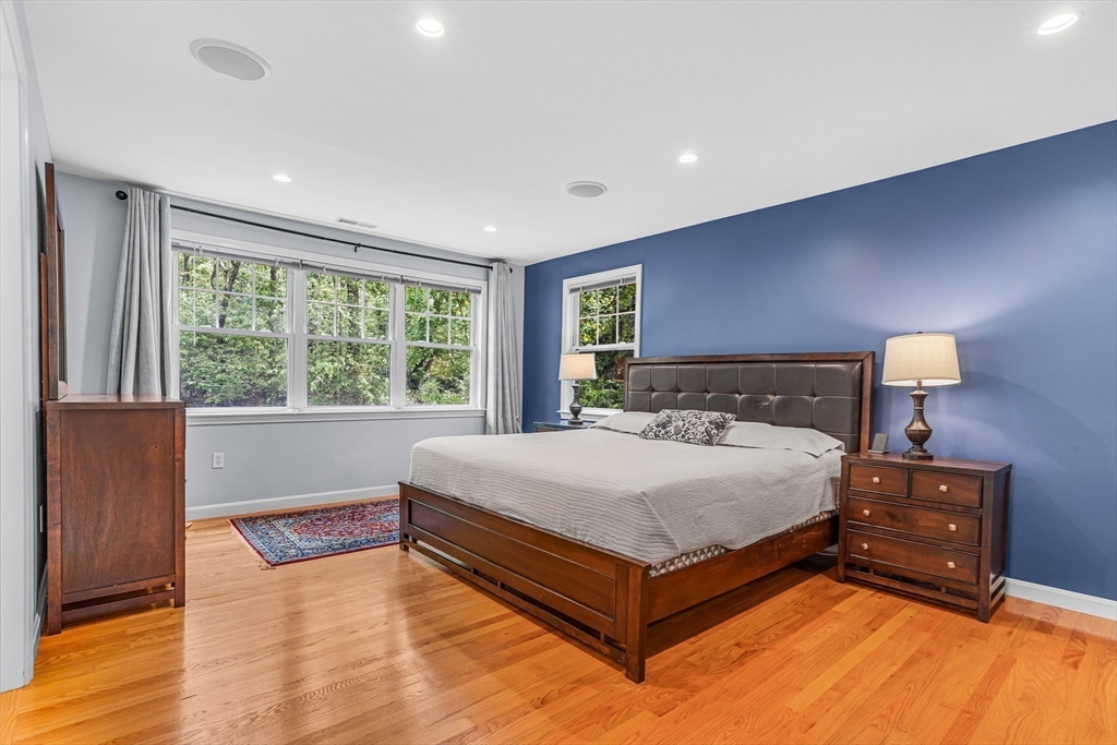 121 Shade Street Lexington, MA 02421 - Photo 20 of 42 a bedroom with a bed and window