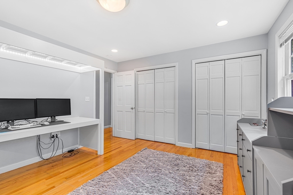 121 Shade Street Lexington, MA 02421 - Photo 30 of 42 a view of a workspace with furniture