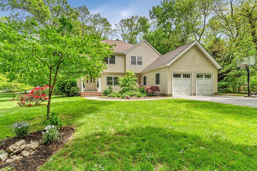 121 Shade Street Lexington, MA 02421 - Photo 3 of 42 a front view of house with yard and green space