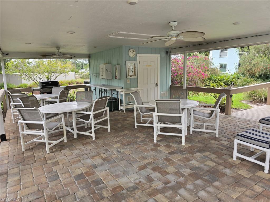 5741 Whitaker Road, Unit D203 Naples, FL 34112 - Photo 21 of 21 Relaxing area by pool