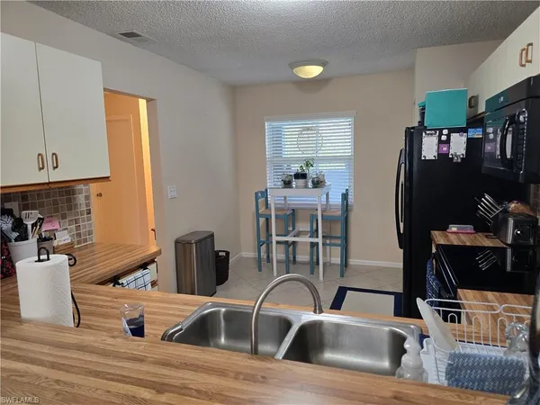 $2,200 | 5741 Whitaker Road, Unit D203, Naples, FL 34112