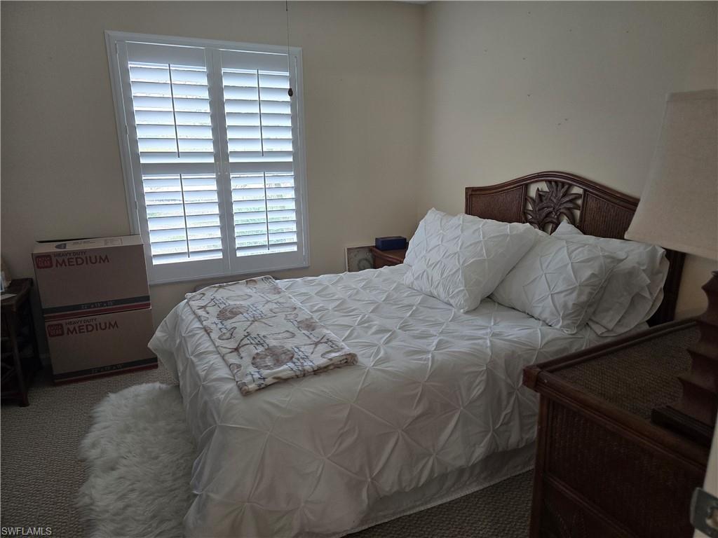 5741 Whitaker Road, Unit D203 Naples, FL 34112 - Photo 9 of 21 View of carpeted 3rd bedroom. Unit is being rented unfurnished