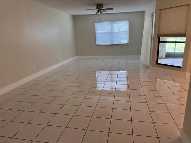 a view of an empty room and window