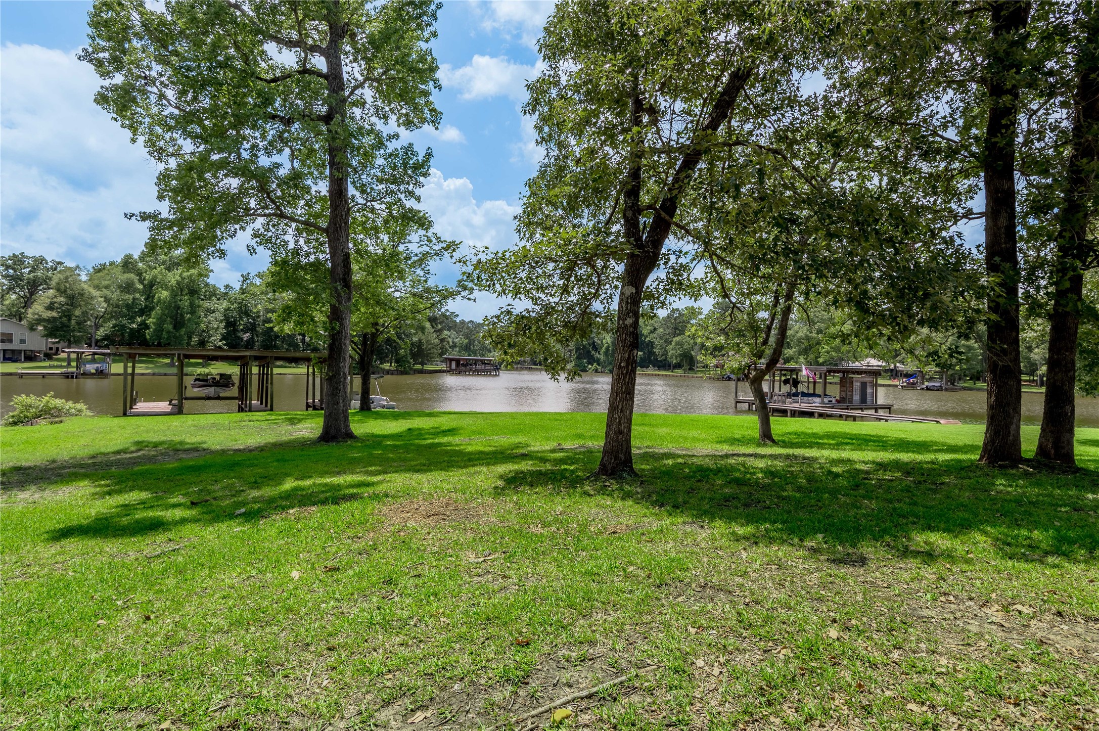 324 Red Oak Lane Trinity, TX 75862 - Photo 39 of 49 a view of green field with trees in the background
