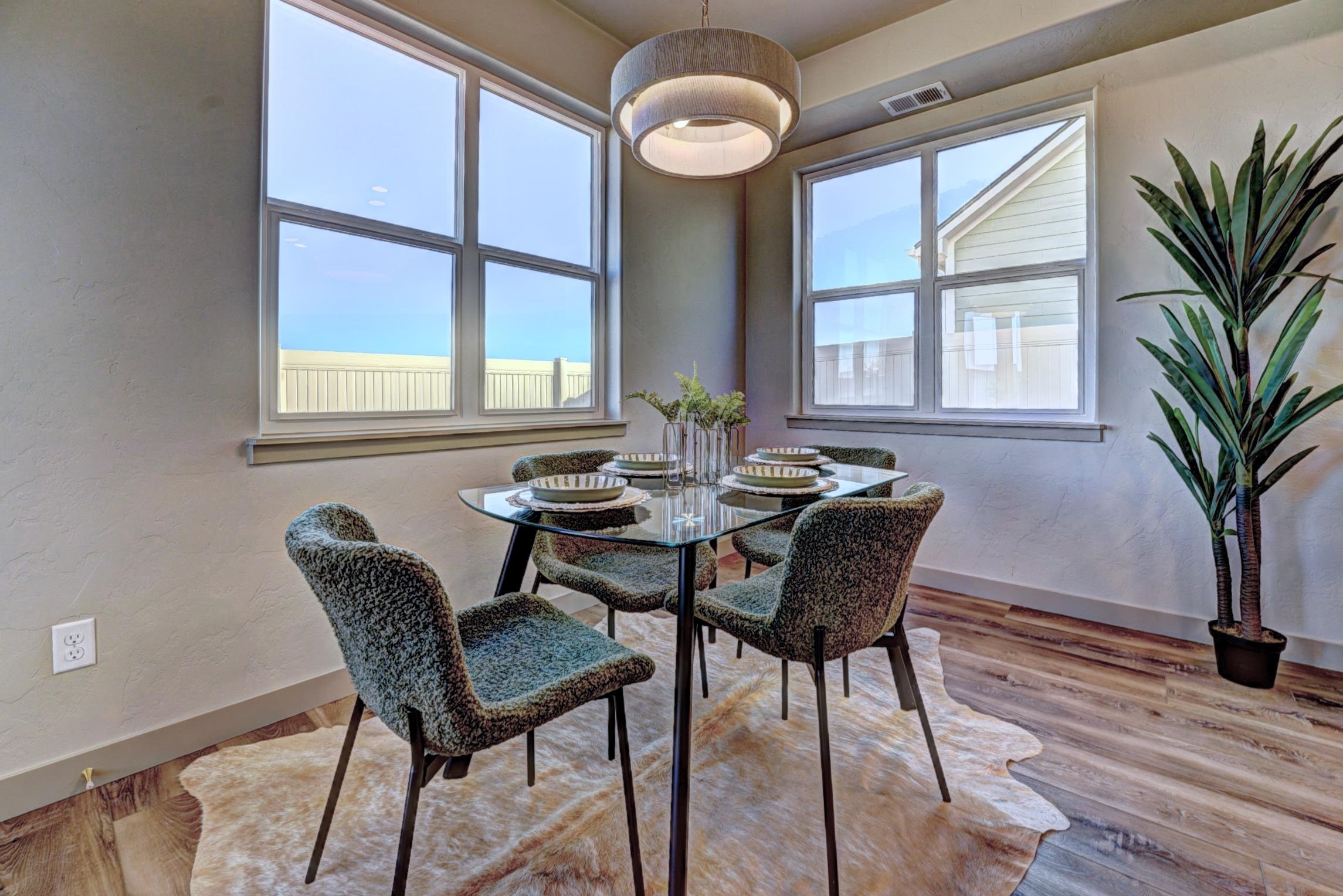 1985 Tomochic Drive Fruita, CO 81521 - Photo 12 of 42 a view of a dining room with furniture window and wooden floor