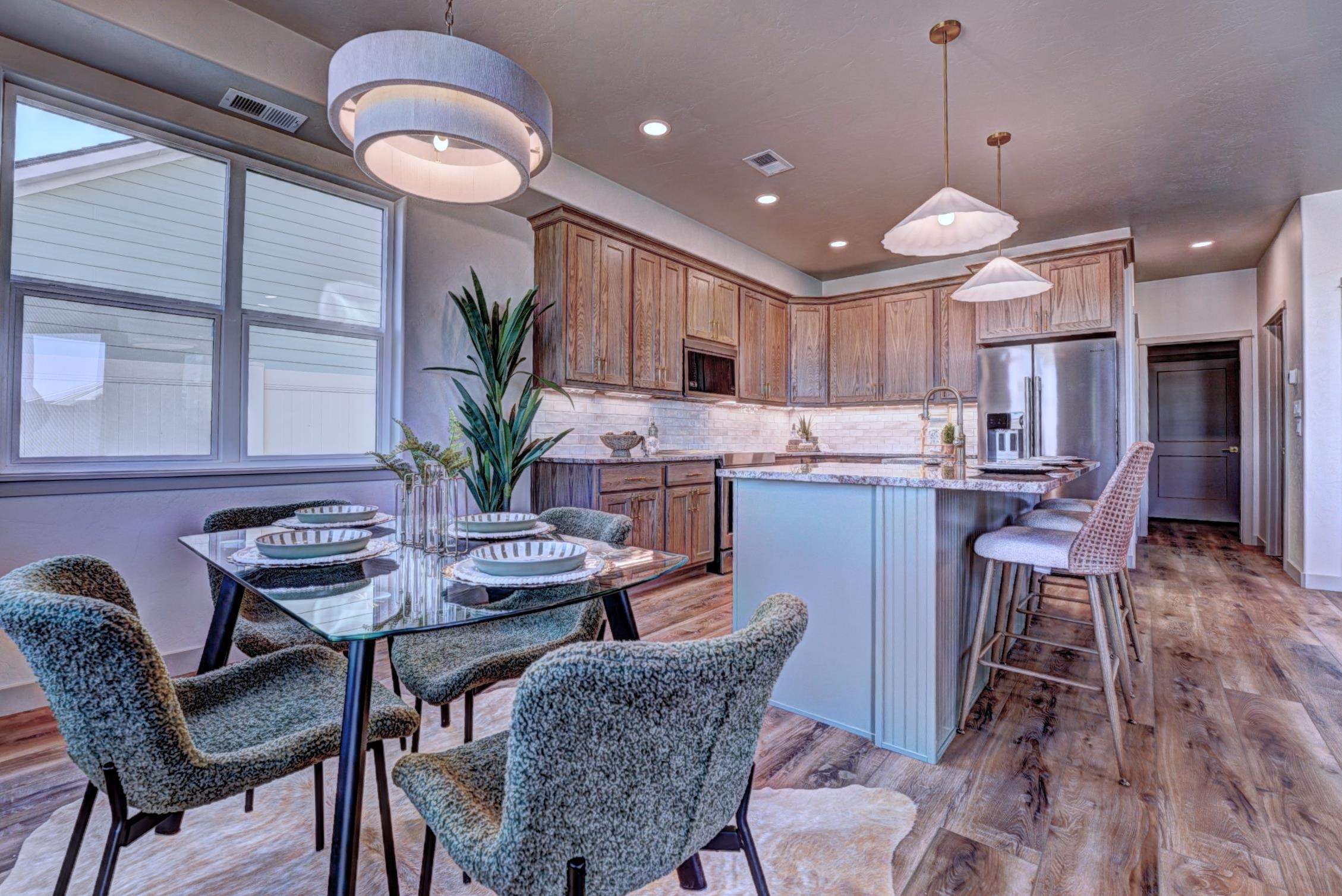 1985 Tomochic Drive Fruita, CO 81521 - Photo 13 of 42 a view of a dining room with furniture