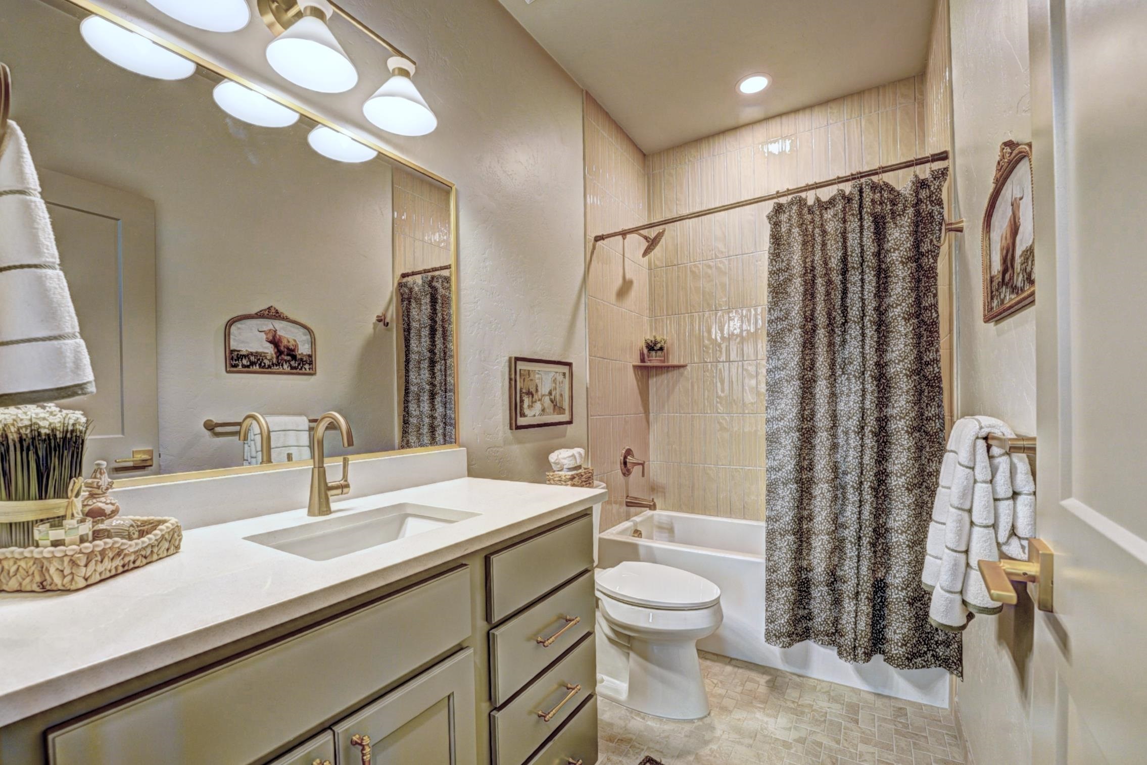 1985 Tomochic Drive Fruita, CO 81521 - Photo 18 of 42 a bathroom with a double vanity sink toilet mirror and shower