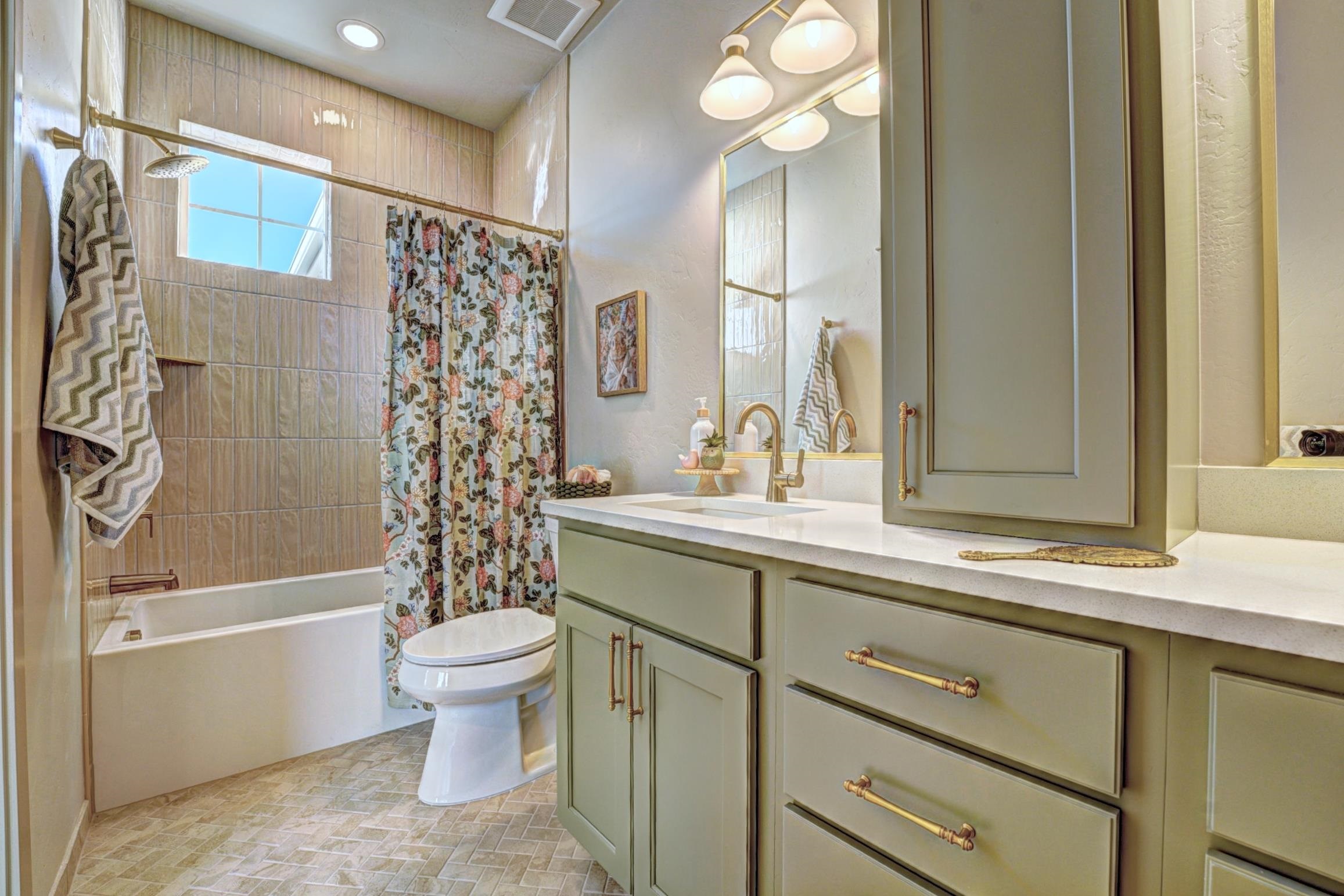 1985 Tomochic Drive Fruita, CO 81521 - Photo 31 of 42 a bathroom with a sink a toilet and shower