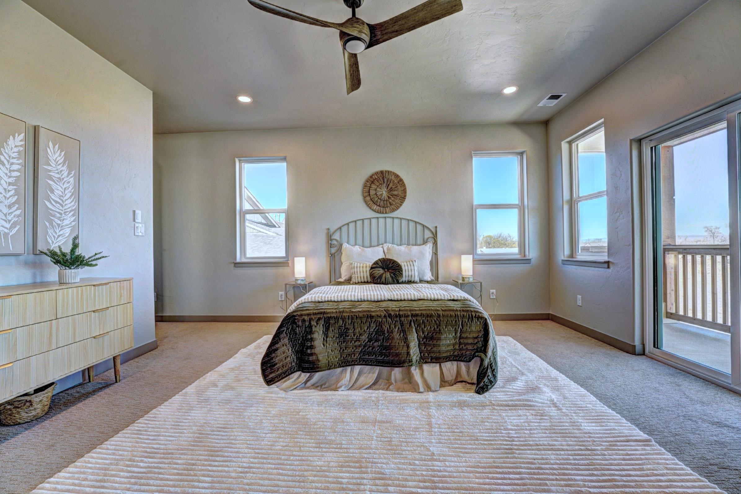 1985 Tomochic Drive Fruita, CO 81521 - Photo 34 of 42 a bedroom with a bed and window