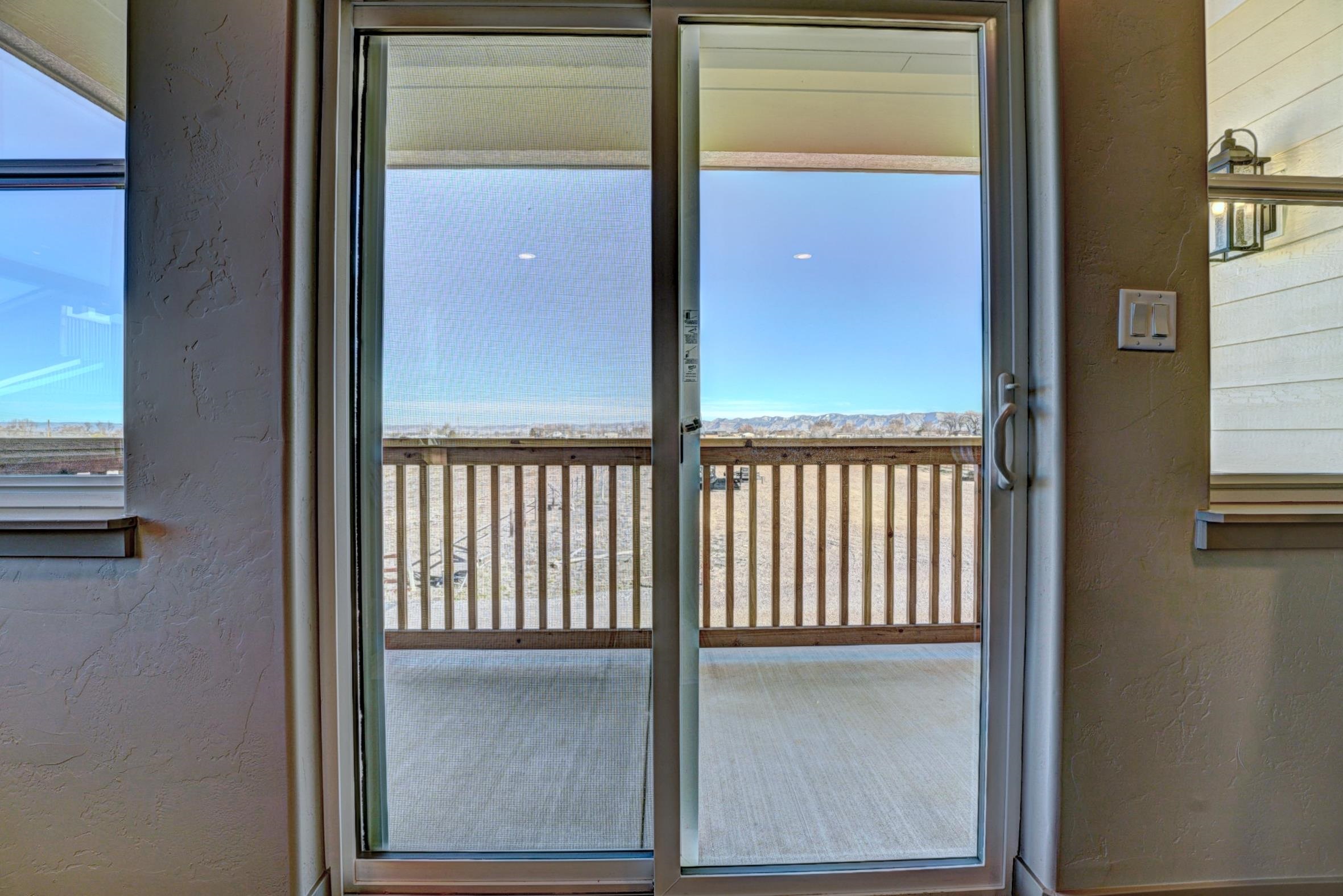 1985 Tomochic Drive Fruita, CO 81521 - Photo 37 of 42 a view of a glass door with a door and chair