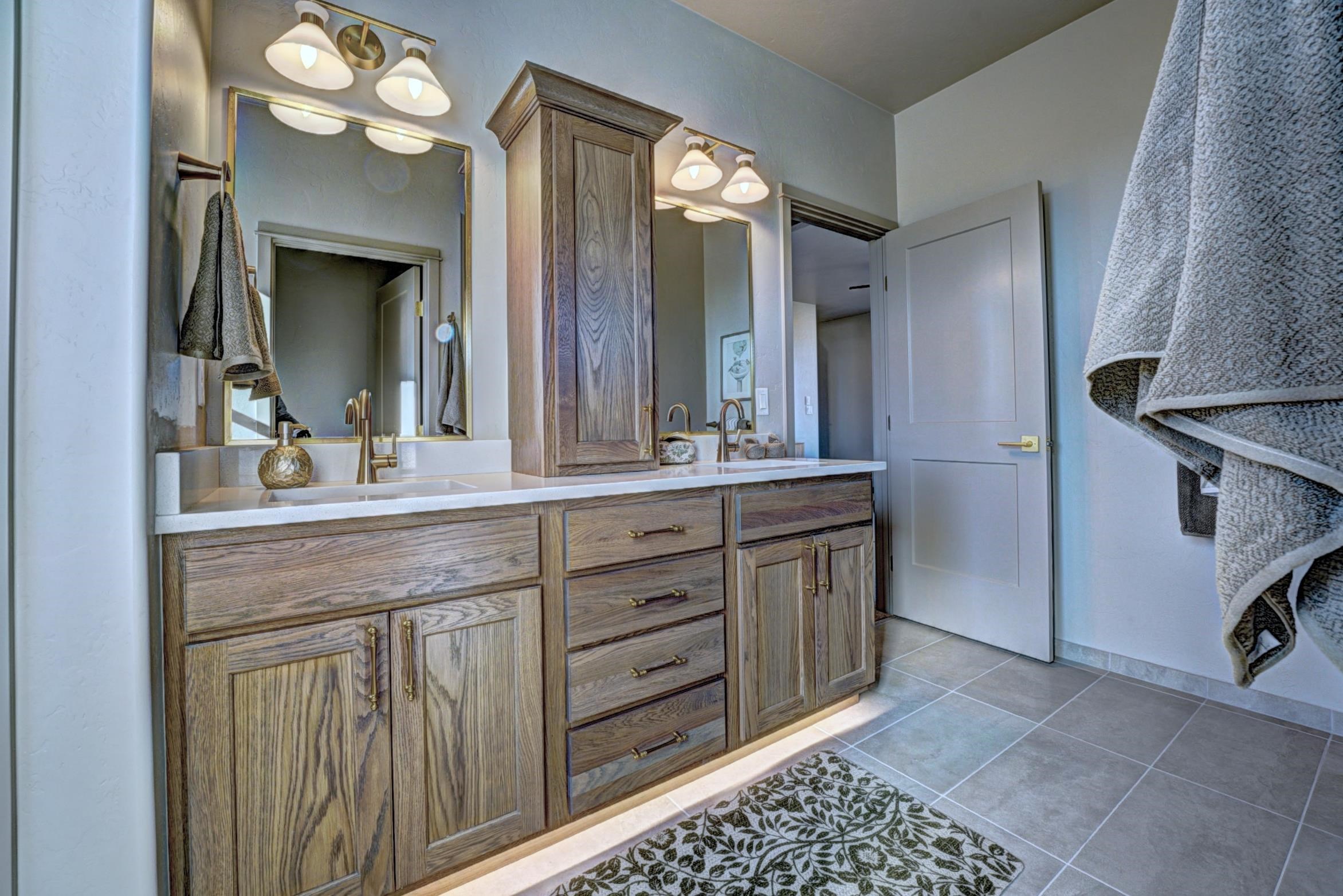 1985 Tomochic Drive Fruita, CO 81521 - Photo 42 of 42 a bathroom with a sink and a mirror