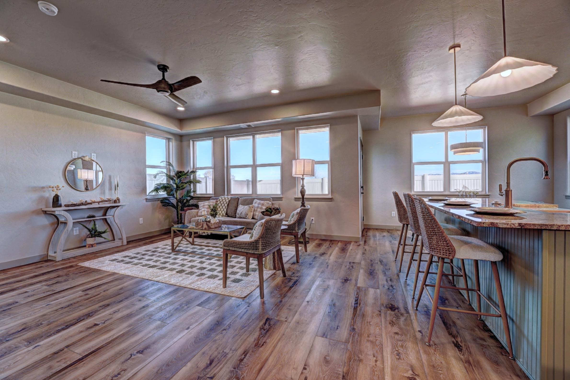 1985 Tomochic Drive Fruita, CO 81521 - Photo 7 of 42 a view of a a dining room with furniture window and wooden floor