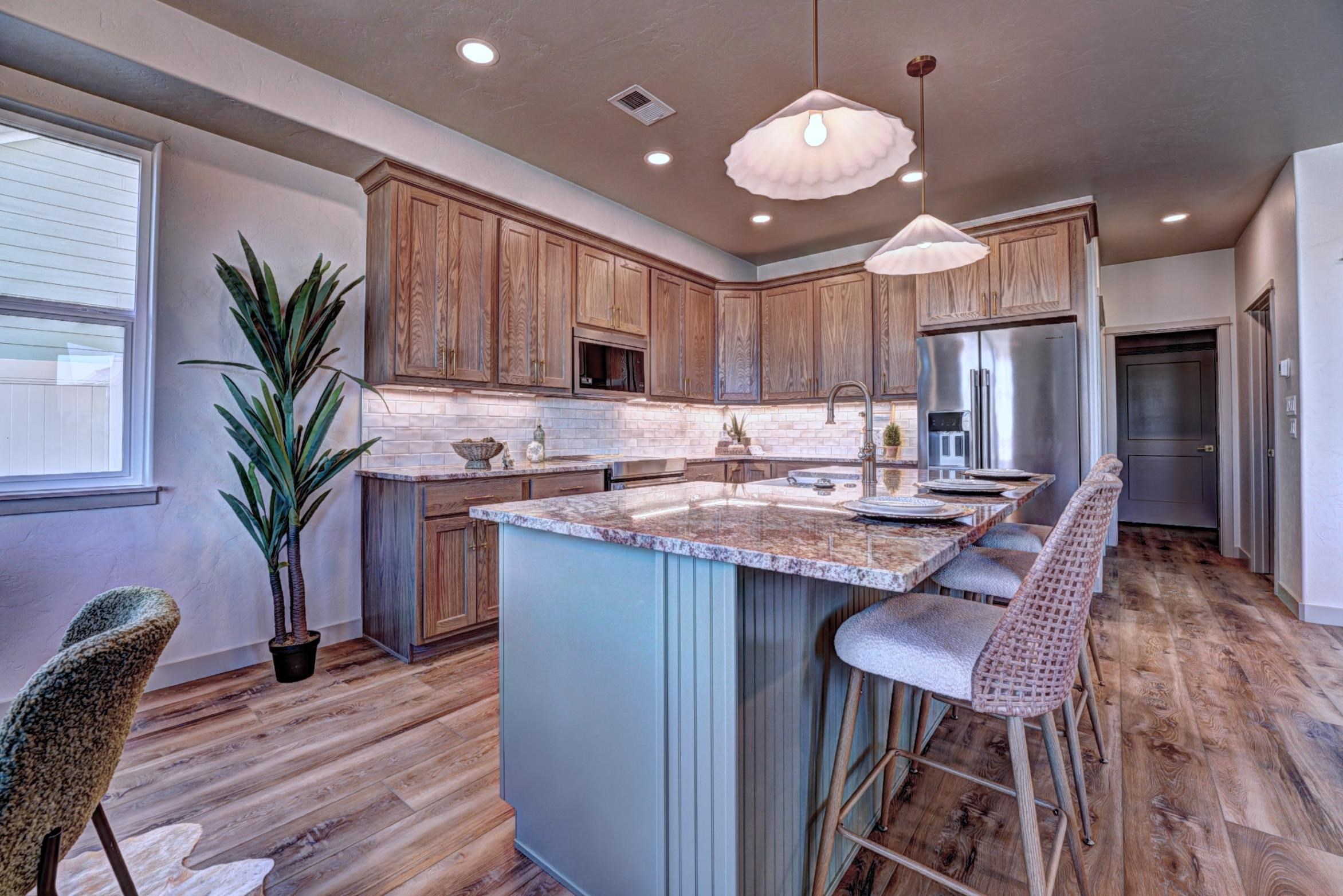 1985 Tomochic Drive Fruita, CO 81521 - Photo 10 of 42 a kitchen with a table and chairs in it