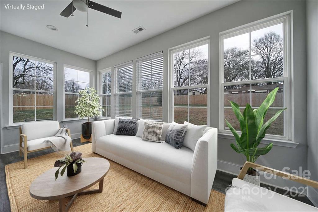 5040 Cheviot Road Charlotte, NC 28269 - Photo 11 of 27 a living room with furniture and a large window