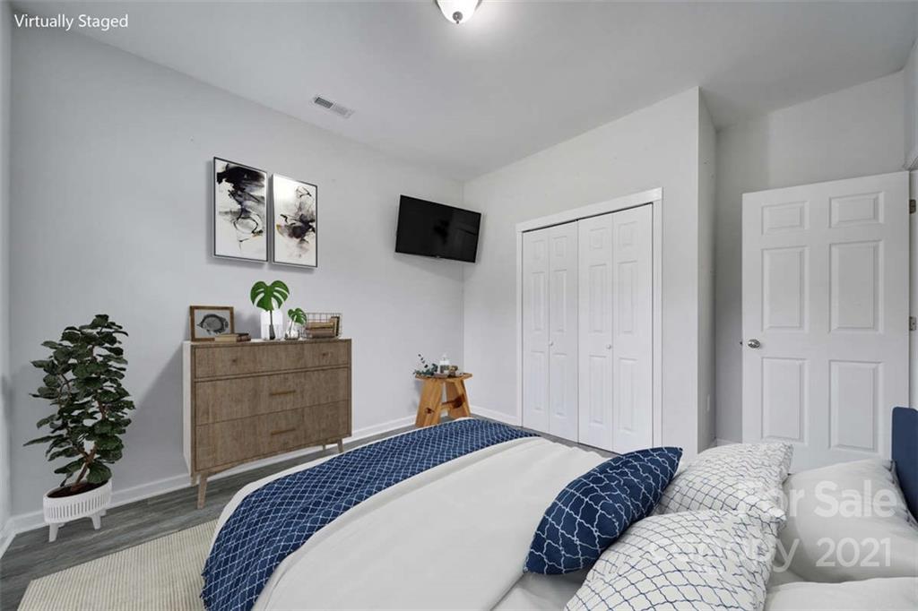 5040 Cheviot Road Charlotte, NC 28269 - Photo 19 of 27 a bedroom with a bed and a window