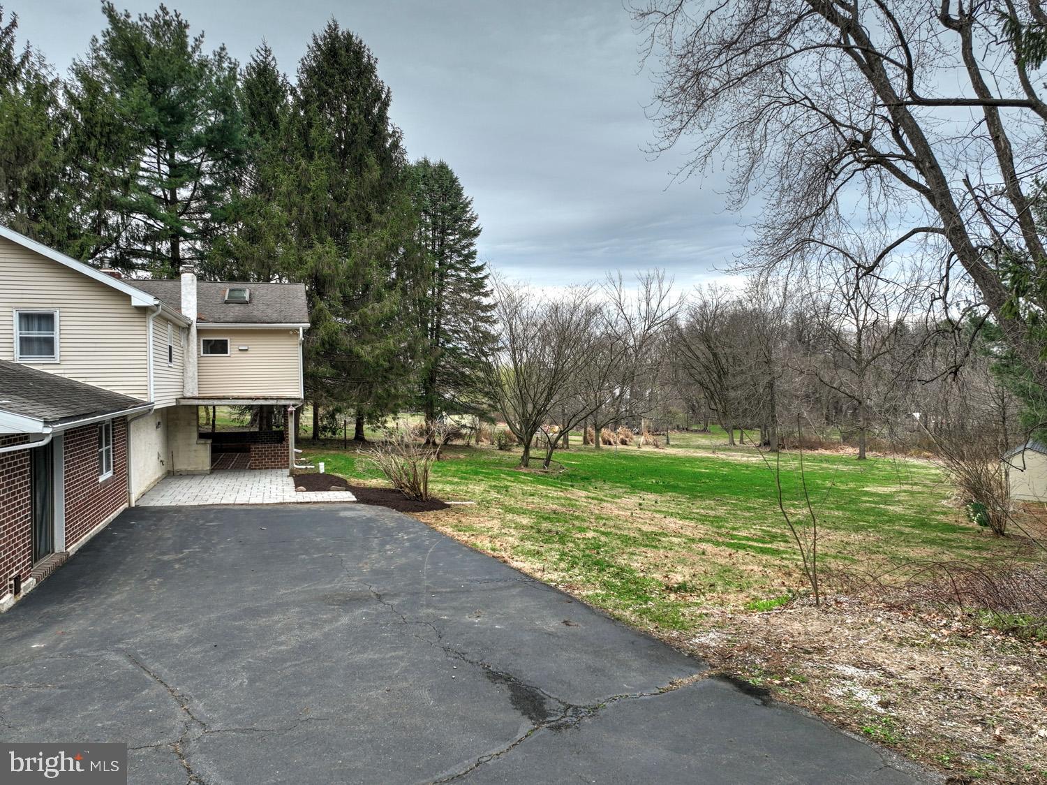 1822 Little Conestoga Road Elverson, PA 19520 - Photo 14 of 30 a view of a house with a back yard