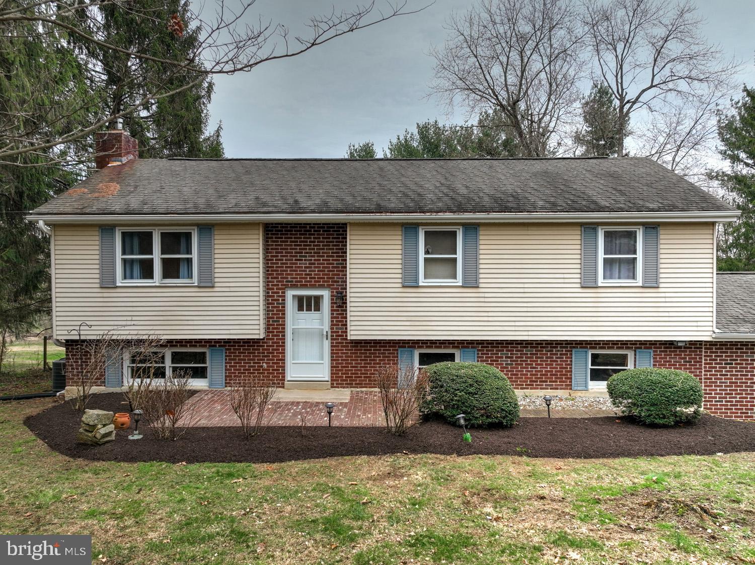 1822 Little Conestoga Road Elverson, PA 19520 - Photo 2 of 30 a front view of a house with a yard